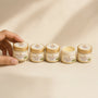 Adbhut Ghrit pack of 5 - five 10ml jars with one open showing the balm