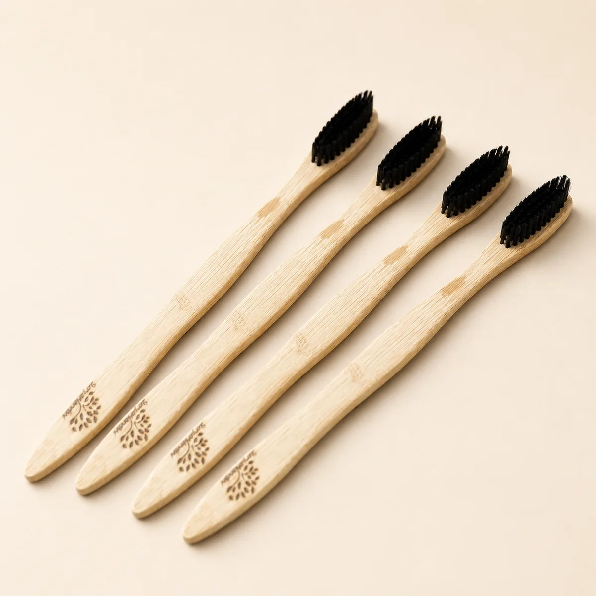 Bamboo toothbrush pack of 4 - four eco-friendly brushes fanned out